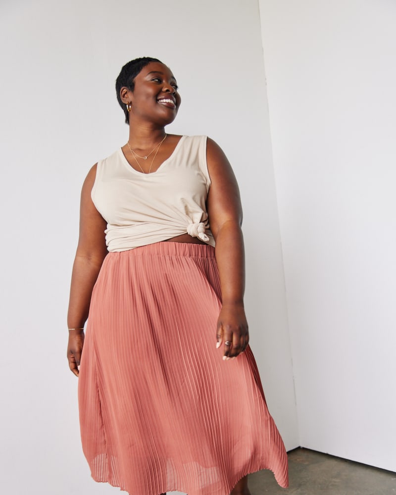 Front of a model wearing a size 1X Angela Drapey Tank in Hummus by ABLE. | dia_product_style_image_id:271444